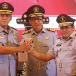 Momen saat Menkumham Yasonna Laoly melantik Silmy Karim sebagai Dirjen Imigrasi di era Presiden Jokowi/foto: rakyat merdeka