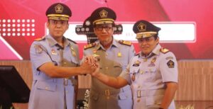 Momen saat Menkumham Yasonna Laoly melantik Silmy Karim sebagai Dirjen Imigrasi di era Presiden Jokowi/foto: rakyat merdeka
